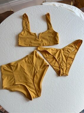Reformation Swim, top and high waisted bottoms and low waist cheeky bottom